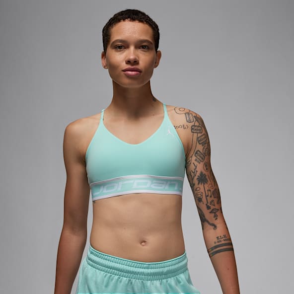 Green Nike Indy Recycled Polyester Sports Bras. Nike